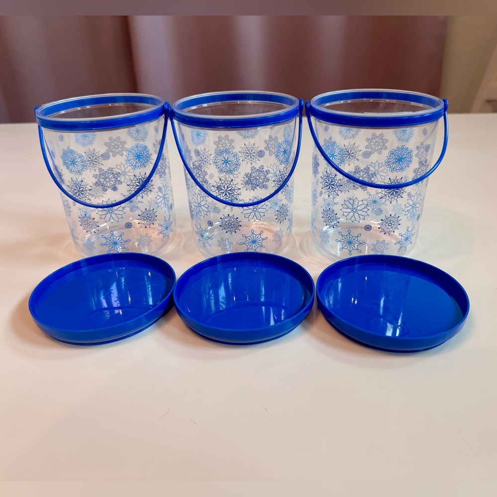 Clear Holiday Buckets with Blue Snowflakes, handle and lid. Sold separately.